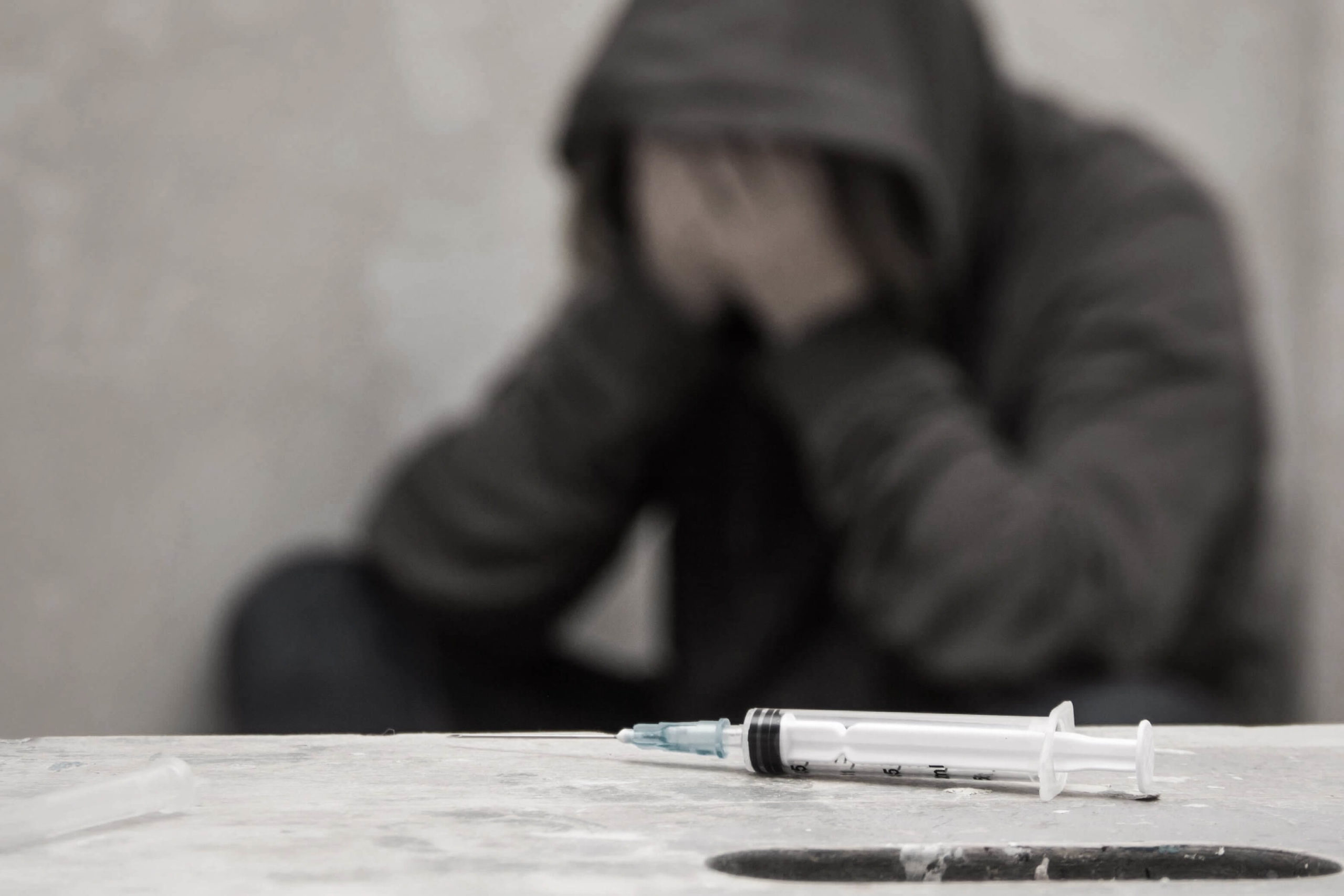 addict suffering from heroin withdrawal during detox