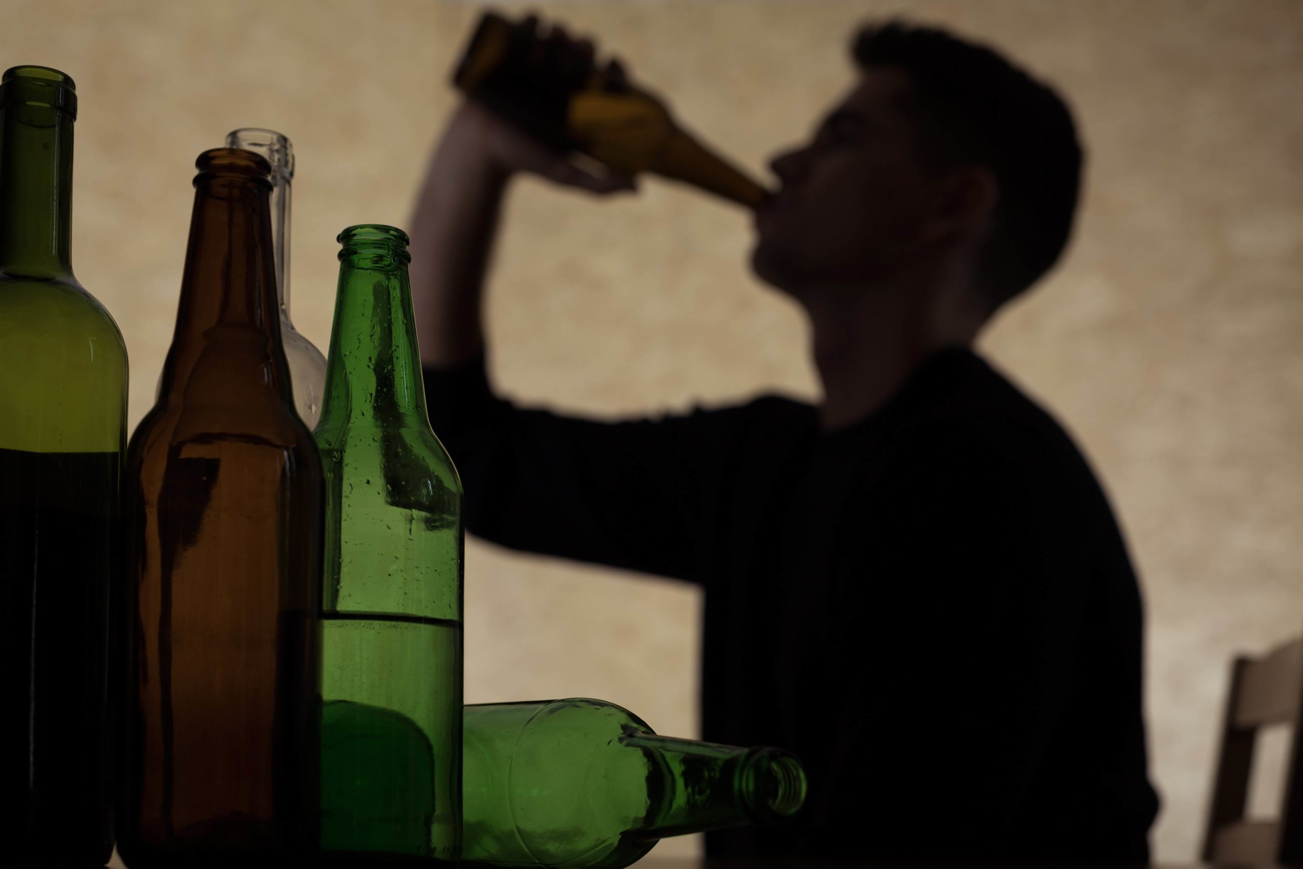 man struggling with alcoholism